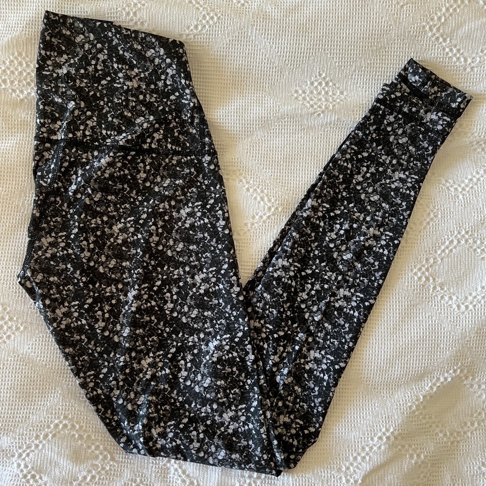 Lululemon, size 4, black, white and grey confetti leggings, 7/8 length